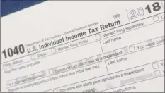  ?? Mark Lennihan / Associated Press ?? the 2017 republican tax law places a $10,000 cap on the state and local taxes you can deduct on your federal tax return. Gov. Andrew Cuomo is in Washington seeking support to get the cap rolled back.