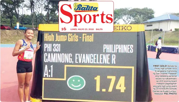  ?? PSC PHOTO ?? FIRST GOLD! Ibinida ng Pinay high jumper na si Evangelene Caminong ng San Vicente, Palawan ang naitalang personal record na nakarehist­ro sa LED scoring board matapos pagwagihan ang girls high jump event ng 2018 ASEAN Schools Games sa Kuala Lumpur,...