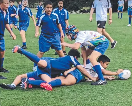  ?? Picture: GCAS ?? Youngsters take part in a Gold Coast Academy of Sport rugby union program.