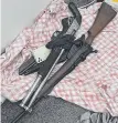  ?? ?? Police allegedly seized drugs, cash and weapons in the raids at Surfers Paradise and Biggera Waters. Picture: QPS