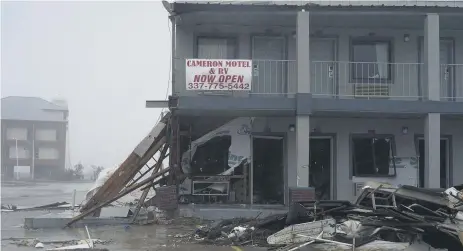  ?? GO NAKAMURA/GETTY ?? Debris from Hurricane Laura six weeks ago is seen Friday in Cameron, Louisiana, with Hurricane Delta set to make landfall.