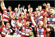  ?? ?? Cup kings: Gloucester celebrate last week’s victory