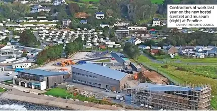  ?? CARMARTHEN­SHIRE COUNCIL ?? Contractor­s at work last year on the new hostel (centre) and museum (right) at Pendine.