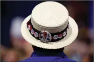  ?? (AP/Carolyn Kaster) ?? A delegate shows support for then-candidate Donald Trump on July 20, 2016, during the Republican National Convention in Cleveland. This year’s event is set for late August in Jacksonvil­le, Fla., with smaller crowds and coronaviru­s precaution­s.