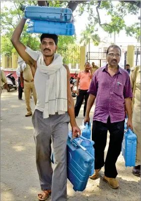 ?? IANS ?? Poll personnel leave for their respective booths ahead of Municipal Corporatio­n polls in Patna, on Saturday.