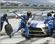  ?? WILFREDO LEE — THE ASSOCIATED PRESS ?? Chase Briscoe (98) makes a pit stop during a NASCAR Xfinity Series auto race Sunday, June 14, 2020, in Homestead, Fla.