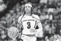  ?? Mark Humphrey / Associated Press ?? South Carolina and Destanni Henderson lost Sunday but held on to the No. 1 ranking in the Associated Press Top 25 poll.