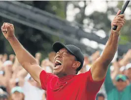  ?? Picture: MIKE EHRMANN/ GEORGIA. KEVIN C. COX/ GETTY IMAGES/AFP ?? BLISSFUL JOY: American golfer, Tiger Woods, reacts after winning the Masters at Augusta National Golf Club on Sunday in Georgia.