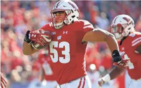  ?? MARK HOFFMAN / MILWAUKEE JOURNAL SENTINEL ?? Wisconsin linebacker T.J. Edwards tied for the team lead with four intercepti­ons this past season. Edwards was second on the Badgers in tackles with 81.