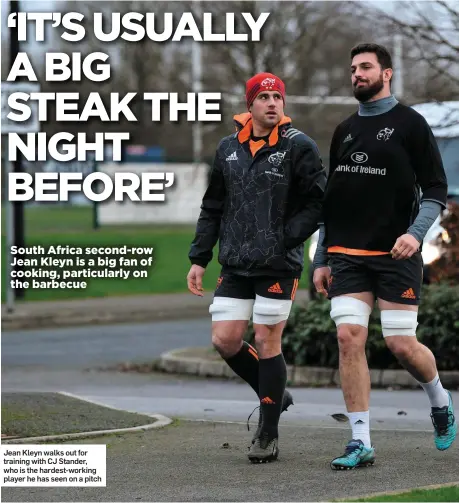  ??  ?? Jean Kleyn walks out for training with CJ Stander, who is the hardest-working player he has seen on a pitch