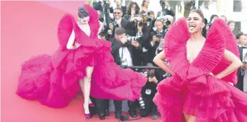  ??  ?? Deepika on arrival for the recent Cannes Film Festival.