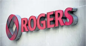  ?? AARON VINCENT ELKAIM/THE CANADIAN PRESS ?? Rogers reported 72,000 net additions for the fourth quarter — enough to bring the annual net additions for Rogers to 354,000, the best in years.