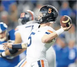  ?? GEORGE FREY/AP ?? Virginia quarterbac­k Brennan Armstrong is a game-time decision after suffering a rib injury versus BYU.