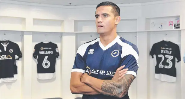  ??  ?? LONDON RETURN: Socceroos star Tim Cahill looks around the Millwall dressingro­om.