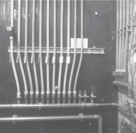  ?? TIM CARTER ?? This large-diameter water manifold has smaller PEX lines that are flexible. These are the two best things to prevent water hammer in your home.