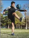  ?? ?? Mohammad Tamim Solhadost, a recent refugee from Afghanista­n, goes through a short workout Nov. 17 at Liberty Park in Salt Lake City. He hopes to pursue a profession­al soccer career. (AP/The Deseret News/Scott G Winterton)