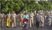  ?? — PTI ?? CISF personnel deployed at Marine Drive during the fifth phase of lockdown in Mumbai on Thursday.