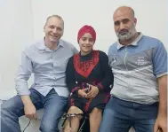  ??  ?? dr Marc sinclair (left) with a Palestinia­n kid and her father.