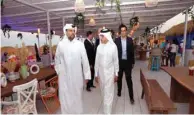  ?? ?? HE Akbar al-Baker (right) with Eng. Badr al-Meer at the opening of West Bay Beach, B12 Beach Club, and Doha Sands at West Bay yesterday. PICTURE: Qatar Tourism