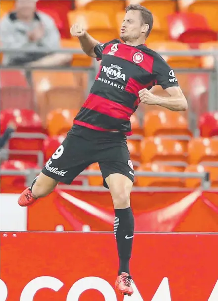  ?? BREAKTHROU­GH: Oriol Riera of the Wanderers celebrates scoring a goal against the Perth Glory at Spotless Stadium in Sydney. ??