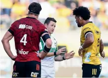  ?? GETTY IMAGES ?? Referee Paul Williams explains a decision to Hurricanes captain Ardie Savea, right, during a Super Rugby match against the Crusaders.