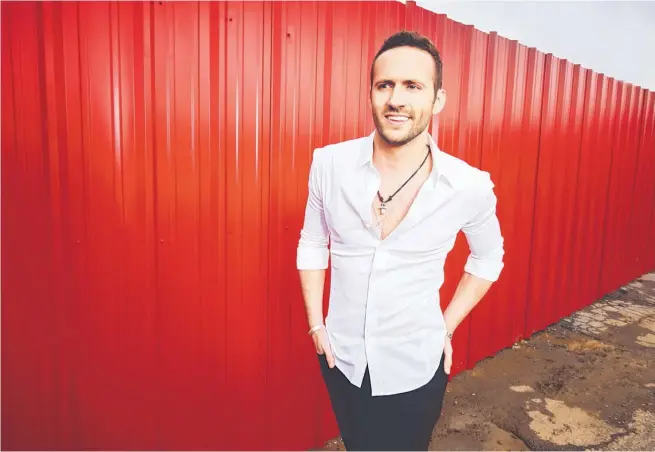  ??  ?? Rising country singer Drew Baldridge is touring in support of his album, “Dirt On Us.”