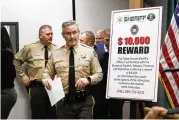  ?? CAROLYN COLE / LOS ANGELES TIMES ?? Tulare County Sheriff Mike Boudreaux, shown at a Jan. 17 news conference, announced Friday the arrest of two suspects in connection with the Jan. 16 killings of six people in a home in Goshen.