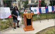  ?? RACHEL RAVINA — MEDIANEWS GROUP ?? Montgomery County Diversity, Equity and Inclusion Chief Donna Richemond smiles as 8-year-old Melody Lian speaks about her artwork in the Art and Prose of Freedom Contest. Winners were recognized on June 15, 2023in Norristown.