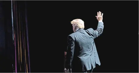  ?? DOUG MILLS THE NEW YORK TIMES ?? U.S. President Donald Trump leaves the stage after addressing the American Farm Bureau Federation’s convention in New Orleans on Monday.