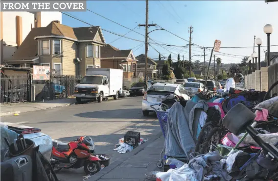  ?? Paul Kuroda / Special to The Chronicle ?? A 39yearold man was killed and two other people wounded in gunfire Thursday in front of the white van on the left on the 1400 block of 89th Avenue.