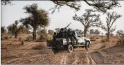  ?? FINBARR O’REILLY / THE NEW YORK TIMES ?? Nigerien soldiers train on the outskirts of Niamey, the capital. Defense Secretary Jim Mattis was reportedly livid over the fact that junior officers were being reprimande­d over the 2017 ambush in Niger that killed four soldiers.