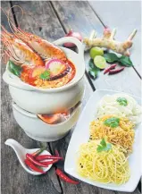  ??  ?? Tom yum goong with three kinds of noodles at the Sky coffee shop, Baiyoke Sky hotel.