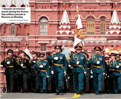  ?? Alexander Zemlianich­enko ?? Russian servicemen march during the Victory Day military parade in Moscow on Monday