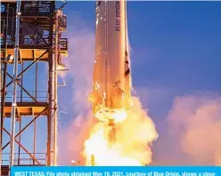  ?? —AFP ?? WEST TEXAS: File photo obtained May 19, 2021, courtesy of Blue Origin, shows a closeup of the New Shepard rocket as it launches in West Texas.