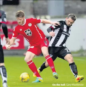  ??  ?? On the ball Gary MacKenzie