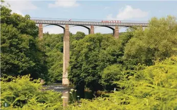  ??  ?? 1
1 Float through the sky on the magnificen­t Pontcysyll­te Aqueduct 2 A steady hand on the tiller: John keeps the Askrigg on course… for now 3 The Poacher’s Pocket offers a welcome stop at the end of a long day on the canal 4 An 11-mile stretch of the...