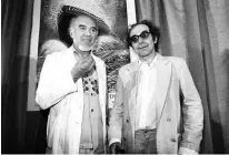  ??  ?? In this file photo taken on May 24, 1982, French actor Michel Piccoli (left) and French filmmaker Jean-Luc Godard pose prior to the screening of “Passion” during a Cannes film festival.