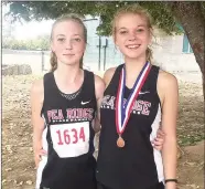  ?? Photograph­s submitted ?? Lady Blackhawks Harmony Reynolds and Adelina Means were named 2017 All State runners.