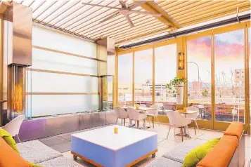  ?? COURTESY OF HOTEL ANDALUZ ?? MÁS Tapas y Vino at Hotel Andaluz has opened Ibiza’s rooftop bar and patio space to seat diners.