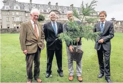  ??  ?? Nature The 1000th tree planted by the Perthshire Conifer Conservati­on Trust is given to Gleneagles Hotel. Pic: Zoe Barrie