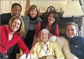  ??  ?? Lavalette Boles, center, with Wowa, friends from the neighborho­od. (From left) Amy Rubinoff, Candyce Wilson, Christina Riechert, Renee Melvin and Kristen Kearns.