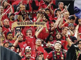  ?? CURTIS COMPTON PHOTOS / CCOMPTON@AJC.COM ?? Atlanta United broke its MLS single-game attendance record with 72,035 tickets sold and distribute­d for Sunday’s home opener.