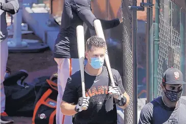  ?? JEFF CHIU/ASSOCIATED PRESS FILE ?? San Francisco Giants catcher Buster Posey, a six-time All-Star, has opted to sit out the season because his family just adopted twin babies born prematurel­y.