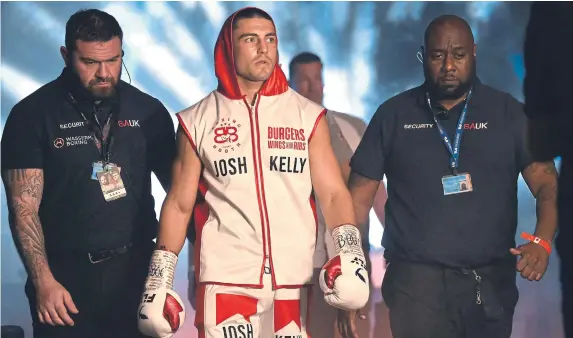  ?? ?? Sunderland boxer Josh Kelly makes his way to the ring during the Super Welterweig­ht fight against Peter Kramer as part of the Wasserman Boxing fight night last June.