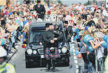  ??  ?? Crowds line the streets of Blackhall for Bradley Lowery’s funeral.