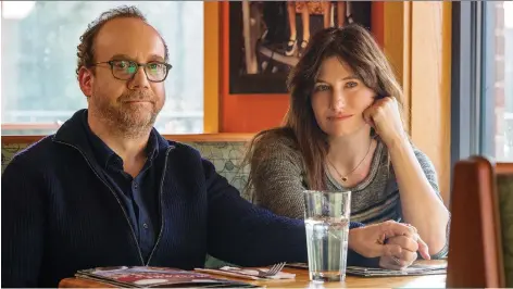  ?? NETFLIX ?? An achingly human performanc­e by Kathryn Hahn, right, seen with Paul Giamatti, in Private Life sets her apart and warrants Oscar recognitio­n, according to Associated Press film critic Jake Coyle.