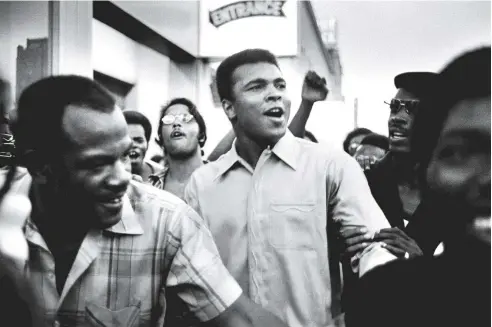  ??  ?? Muhammad Ali in New York with members of the Black Panther Party, September 1970. Black Power supporters were widely regarded as anti-American, and Ali’s refusal to serve in the Vietnam War did little to dispel this perception