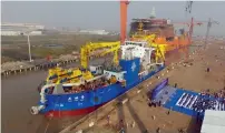  ?? — AFP ?? China has unveiled a massive ship described as a ‘magic island maker’ that is Asia’s largest dredging vessel.