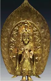  ??  ?? A gilt bronze standing statue of Mahasthama­prapta