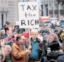  ?? GETTY IMAGES ?? Manifestan­tes se reunieron para protestar contra la aprobación de la reforma fiscal.